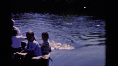 1951: Family Boating on River in New York