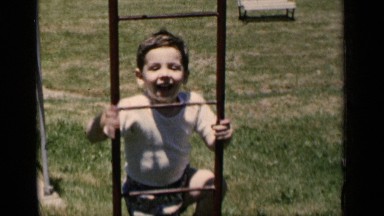 1951: a smart and happy body climbing up a ladder to the balcony NEW YORK
