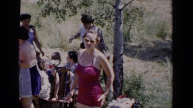 1951: people are entertained their vacation at the outdoor