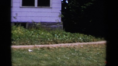 1951: a family sits outside during a sunny day to enjoy the weather NEW YORK