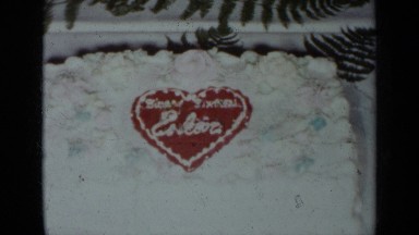 1954: red and white heart shaped icing on a white cake NEW YORK