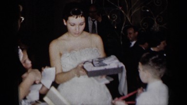 1954: people gathered around table NEW YORK
