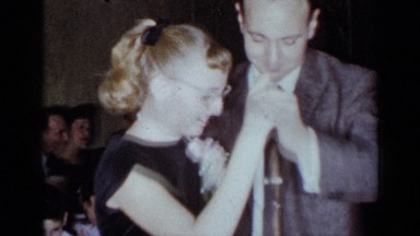 1954: this man is slow dancing with the young woman in a calm place NEW YORK