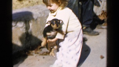1957: girl with a little dog BIRMINGHAM ALABAMA