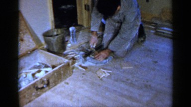 1957: a man is constructing a wood floor BIRMINGHAM ALABAMA