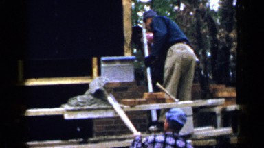 1957: Men Sincerely Constructing a House in Birmingham, Alabama