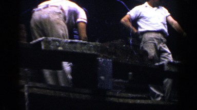 1957: A Group of Hardworking Men Building a Brick Wall in Birmingham, Alabama