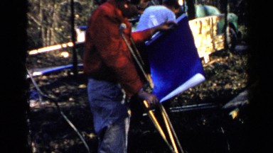 1957: a handicap person and some men doing their work and busy moment during