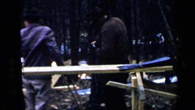 1957: man constructing the frame work for a house BIRMINGHAM ALABAMA