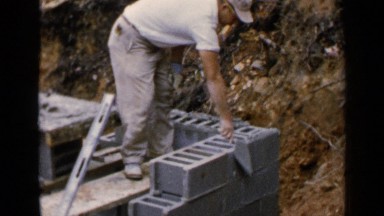 1957: A Man Applying Plaster During Construction Work in Birmingham, Alabama