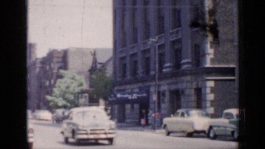 1957: the vehicle is driving on the road and their parking on roadside CHICAGO