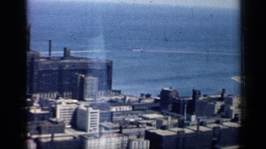 1958: A Zoomed Out View of Chicago with Large Buildings and Skyscrapers