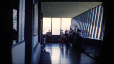 1958: people are watching outside and taking photograph from their vacation