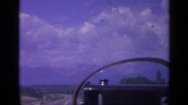 1959: sky through the windshield of a car COLORADO