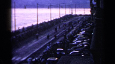 1960: olympic torch runners are escorted past the gathering crowds. ROME ITALY