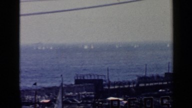 1960: The Reinforced Shore of Sea with Many White Color Yachts Moving Rome Italy