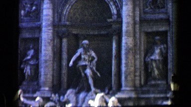 1960: the trevi fountain in rome, italy during the day with several tourists