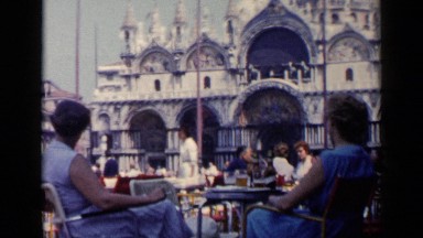 1960: people sitting at tables in front of a castle VENICE ITALY