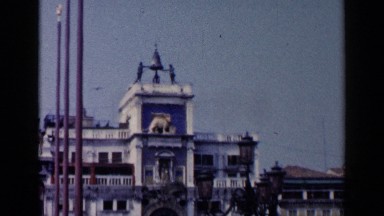 1960: beautiful old building with people milling out front. VENICE ITALY
