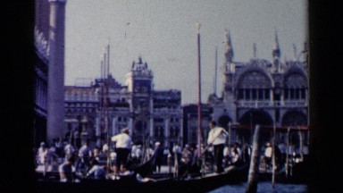 1960: people riding in the watercraft VENICE ITALY