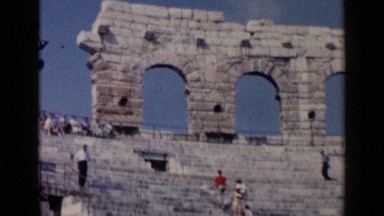 1960: People Exploring Ruins of a Historic Building in Venice, Italy