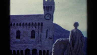 1960: The Church Near Mountains with Statue of Jesus in Venice