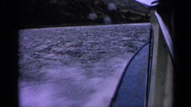 1963: a boat is moving fast at the water and the water split out. IDAHO