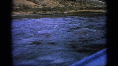 1963: a speed boat moving fast towards destination IDAHO
