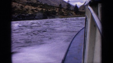 1963: enjoying the lake on a motorboat on an overcast day IDAHO