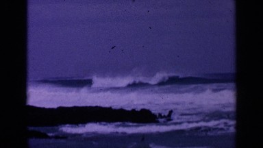 1963: crashing waves hitting a rocky beach during the day time SAN FRANCISCO