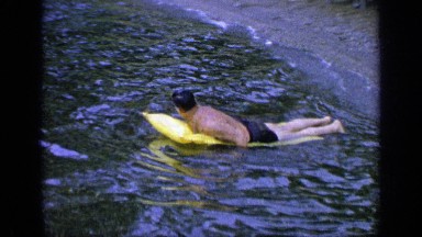 1964: a person is swimming GREENWOOD LAKE NEW YORK