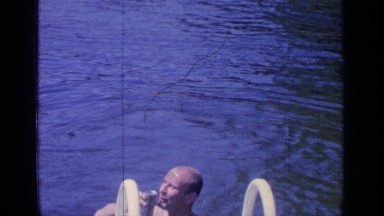 1964: the middle age person standing in the beautiful swimming pool GREENWOOD