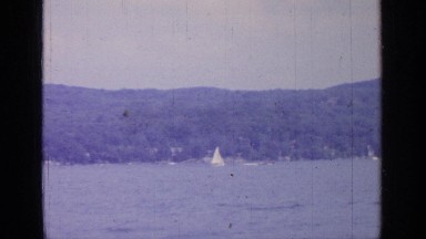 1964: a person is travelling in a boat GREENWOOD LAKE NEW YORK