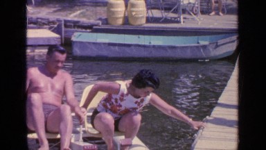 1964: wife returning to the dock after boat ride with husband GREENWOOD
