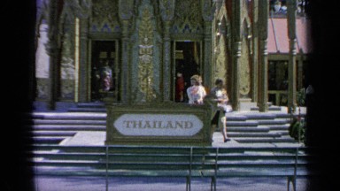 1964: tourists walk around beautiful building in thailand. WORLDS FAIR NEW YORK
