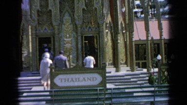 1964: people gathered and entering into the building WORLDS FAIR NEW YORK