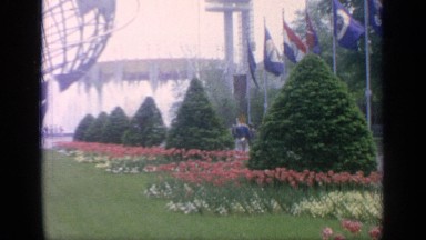 1964: a beautiful park with a large water fountain feature a sculpture