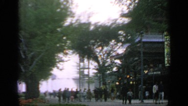 1964: the peoples are walking on the road in front of shops WORLDS FAIR NEW YORK