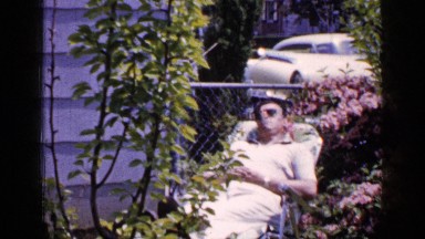 1965: a man lying in the chair and sleeping in the sunlight
