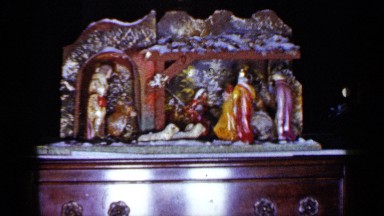 1965: a manger scene on top of a wooden dresser at christmas time LONG ISLAND