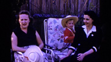 1965: people are gathered and speaking LONG ISLAND NEW YORK