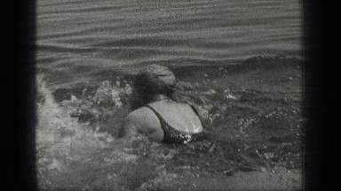 1939: people are swimming in water LONG LAKE CANADA