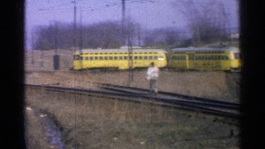 1965: passenger train passes through town. OHIO