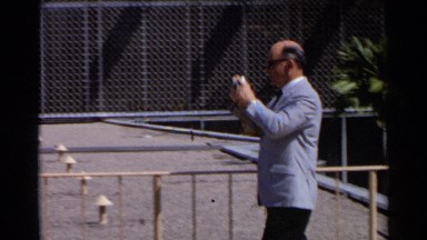 1968: people spending time by taking photographs, watching the scenario etc