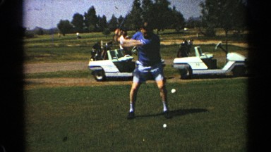 1968: a man hitting a ball while playing golf in a ground SCOTTSDALE ARIZONA