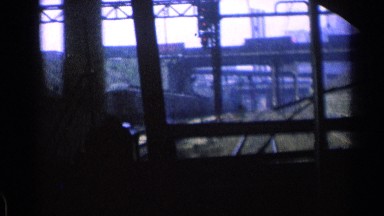 1976: train travelling down tracks, filmed from the driver's cabin ILLINOIS