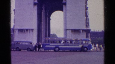 1961: Tour Buses Pause to Allow Sightseers to Inspect the Arc de Triomphe