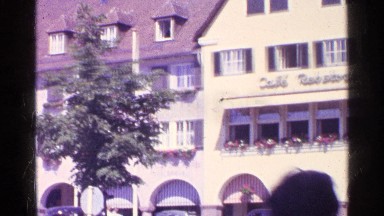 1961: The Beautiful View of the Historic Swiss Town with Arched Buildings and Pedestrians