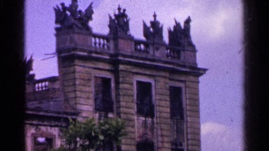 1961: Tall Brown-Brick Building with Statues on Its Top, SWITZERLAND