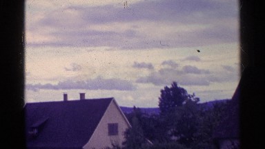 1961: video filmed from the rooftop of a house showing the local neighborhood